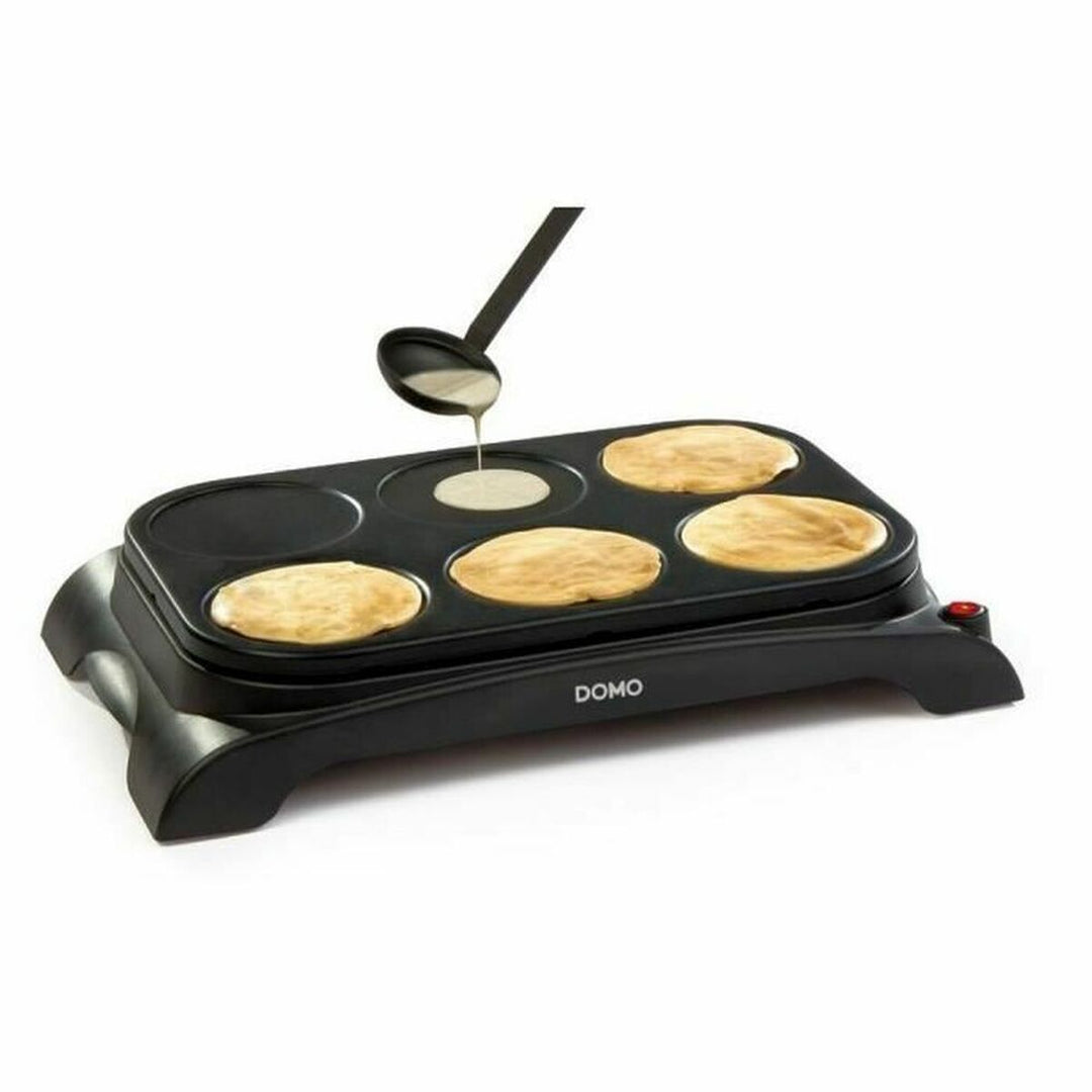 DOMO DO8709P Non-Stick Pannkaksmaskin - Effektiv 1000 W ström för perfekta pannkakor varje gång.